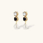 Gold-plated jewelry set with alternating black and clear cubic zirconia stones, featuring necklace, earrings and bracelet