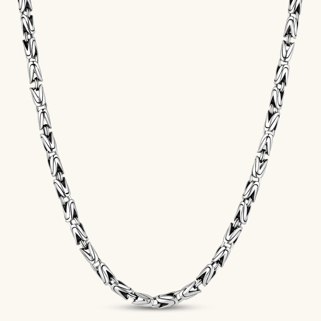 Men's antique silver Byzantine chain necklace, 6.2mm wide interlocking S-link pattern with ornate lobster clasp, 560mm length.