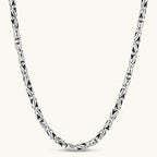 Men's antique silver Byzantine chain necklace, 6.2mm wide interlocking S-link pattern with ornate lobster clasp, 560mm length.